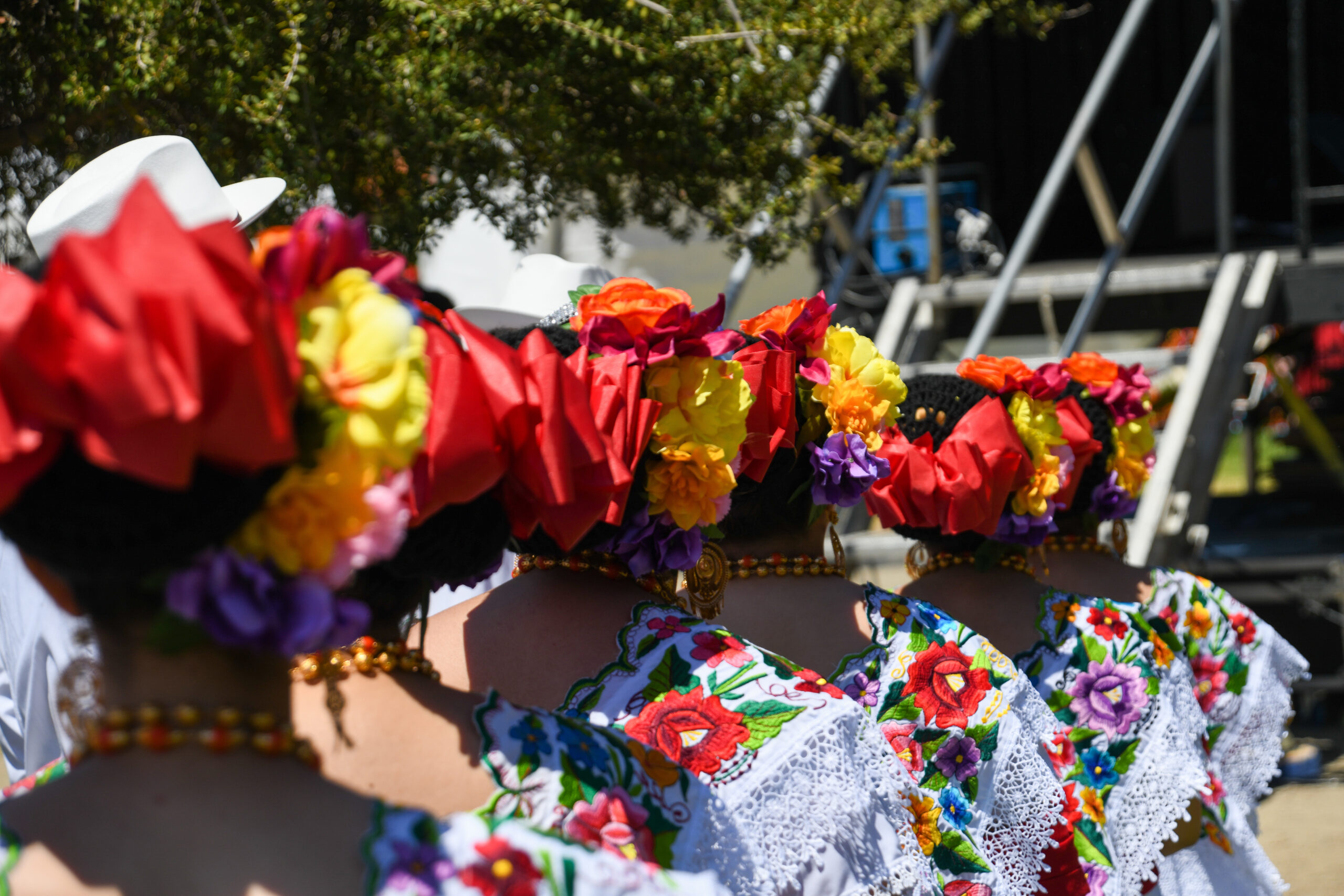 Folklorico dancers preparing for a festival